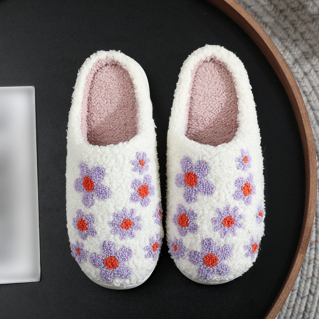 Pantufla de lana bordada con flor de hibisco