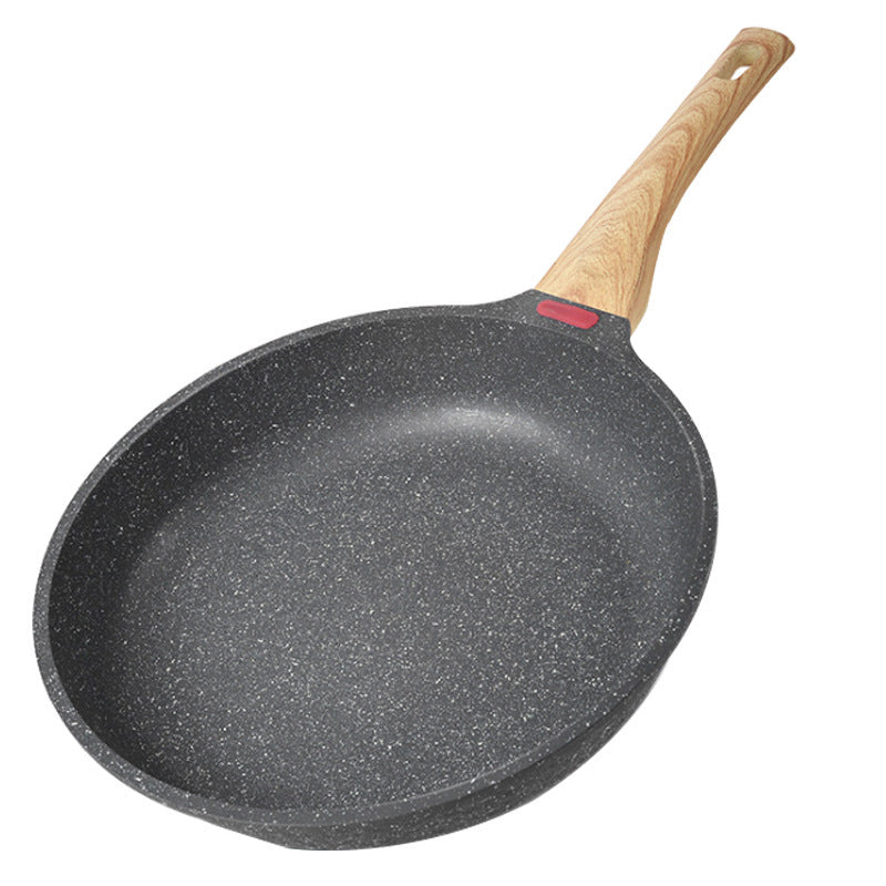 Bratpfanne mit Macadamia-Beschichtung und Antihaft-Oberflächenbehandlung, die das Risiko des Anhaftens von Zutaten beim Kochen verringert.