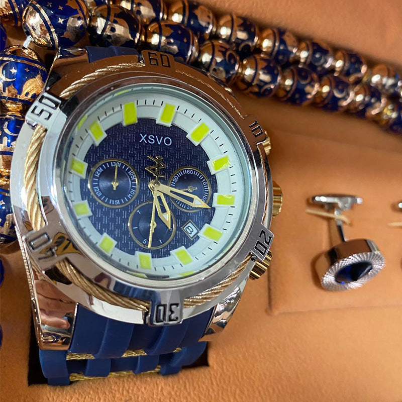 Detta exklusiva presentset kombinerar en stilren kvartsklocka med rosenkrans, manschettknappar och penna