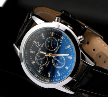 Herrklocka med färgskimrande glas och tre sub-dial detaljer