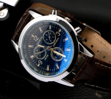 Herrklocka med färgskimrande glas och tre sub-dial detaljer