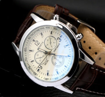 Herrklocka med färgskimrande glas och tre sub-dial detaljer