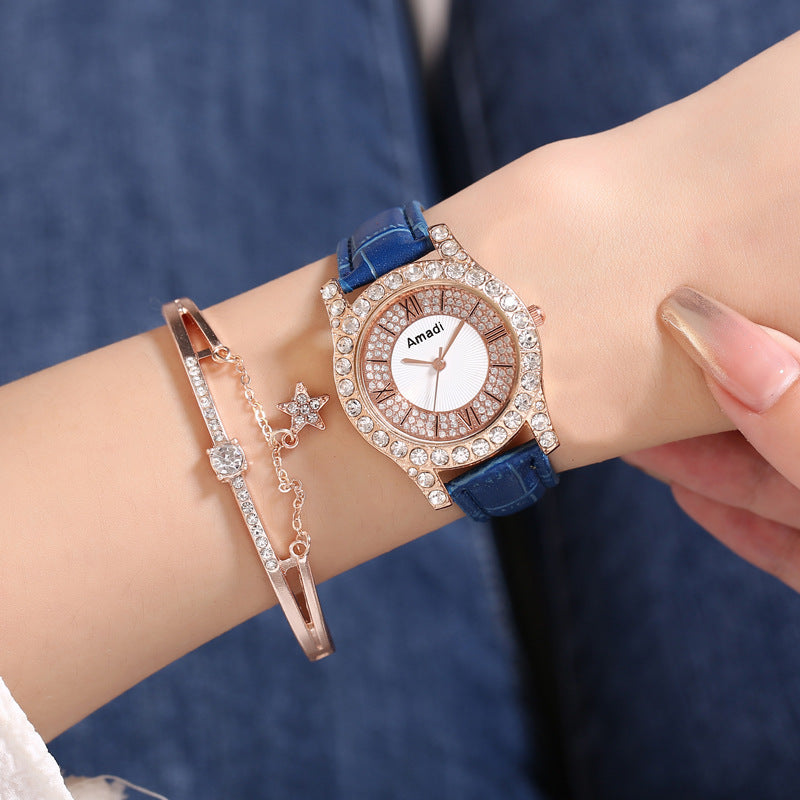 Elegant damklocka med romersk urtavla och diamantdetaljer – enkel, modern och stilren