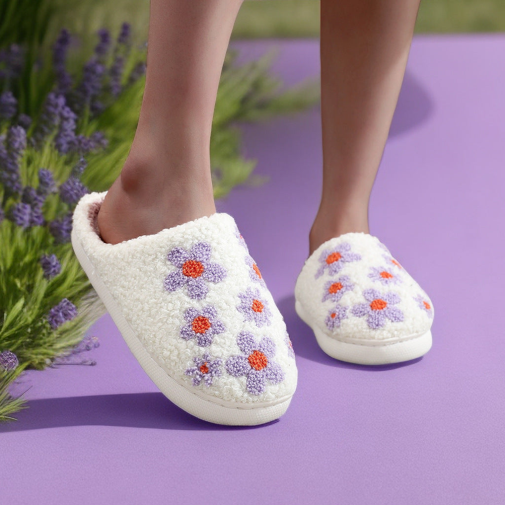 Pantufla de lana bordada con flor de hibisco