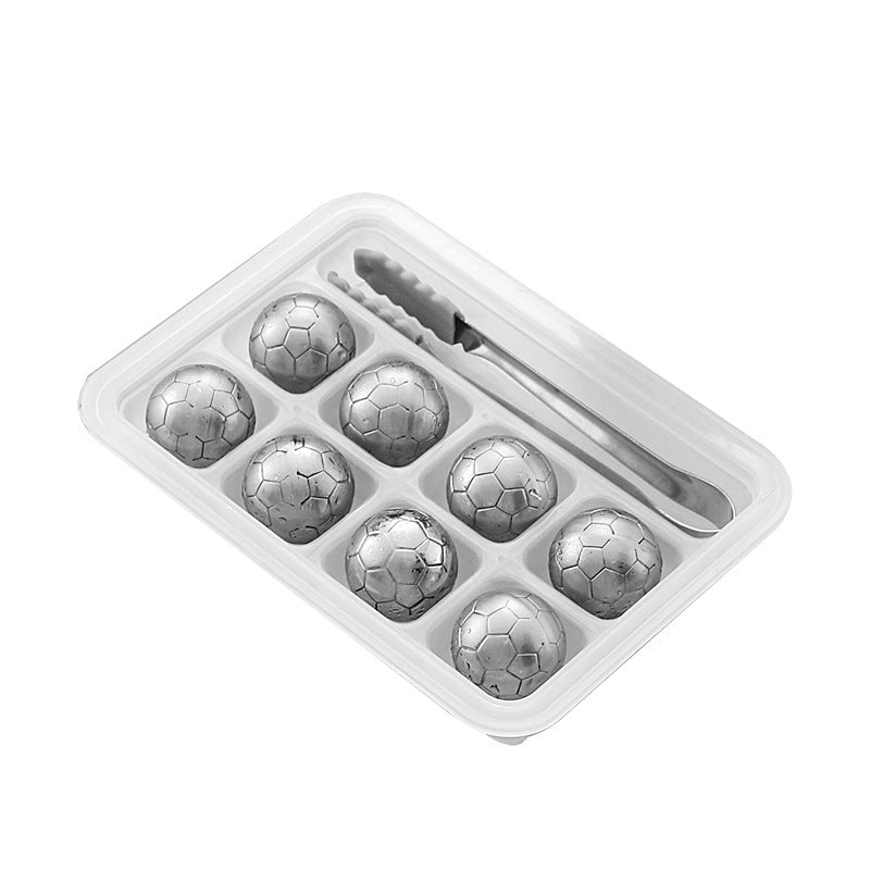 Piedra de whisky de acero inoxidable con partículas de hielo, ideal para enfriar whisky y vino, reciclable.