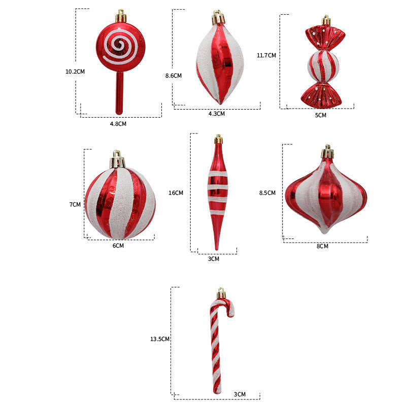 Juldekoration i form av godiskäpp, presentask och stövelhänge