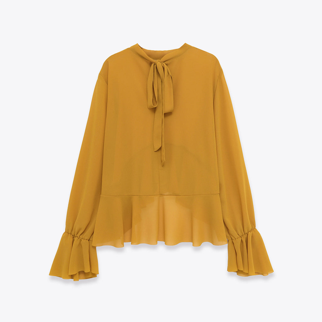 Elegante blusa de gasa con dobladillo fluido con volantes