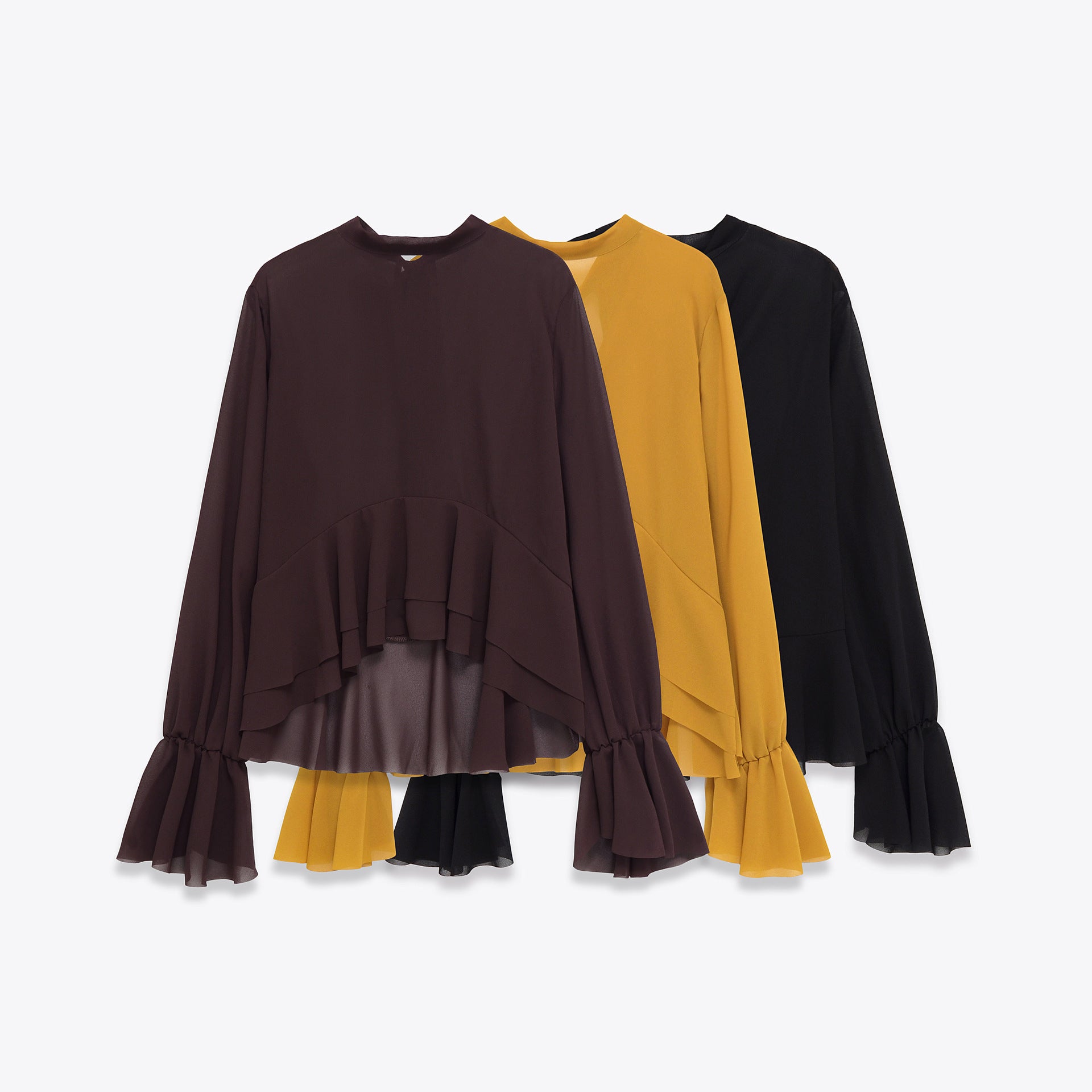 Elegante blusa de gasa con dobladillo fluido con volantes