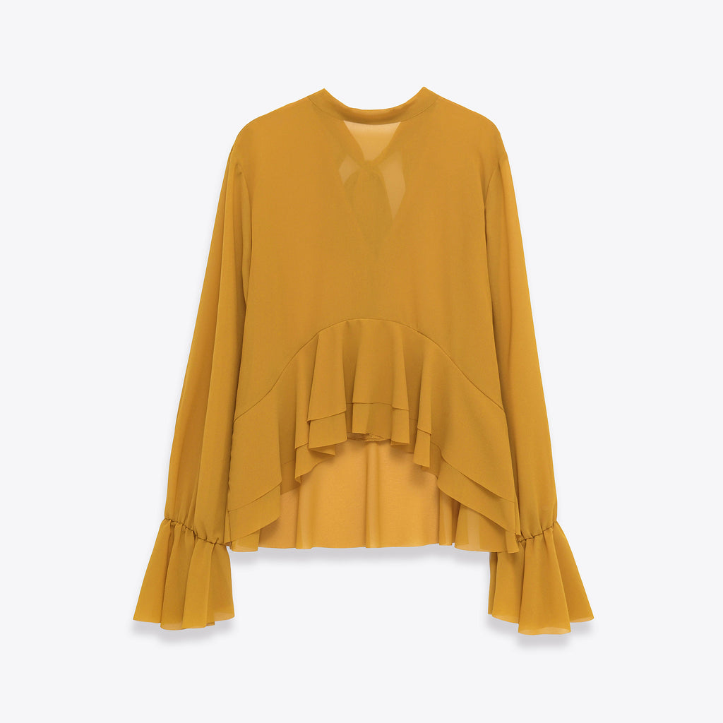 Elegante blusa de gasa con dobladillo fluido con volantes