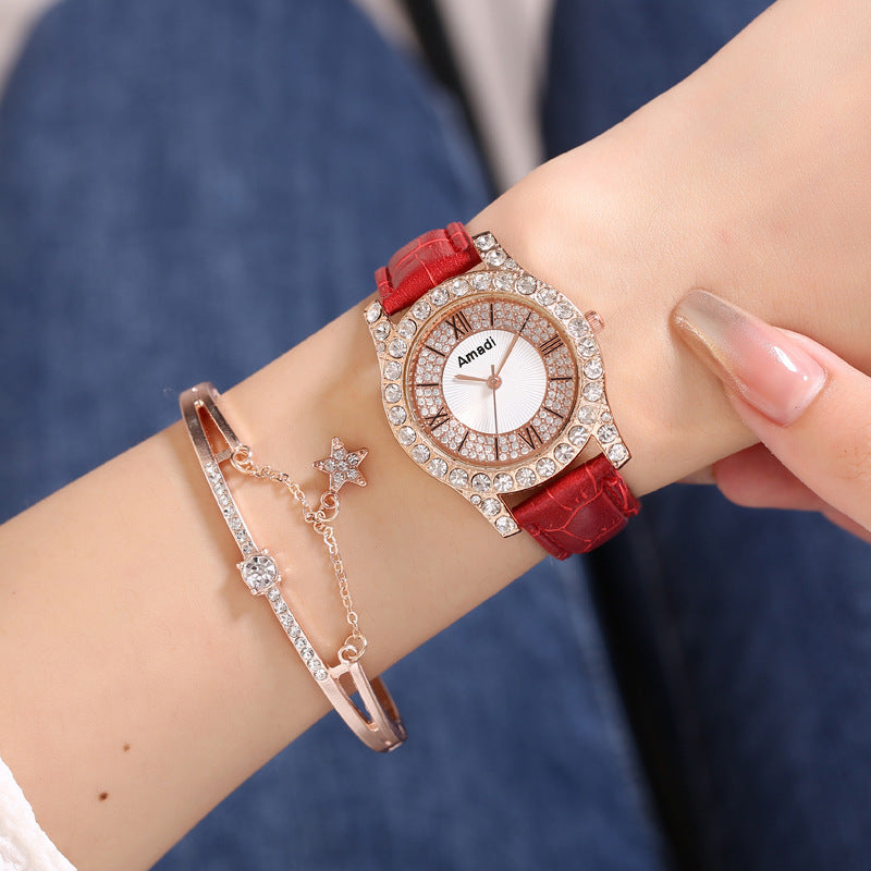 Elegant damklocka med romersk urtavla och diamantdetaljer – enkel, modern och stilren