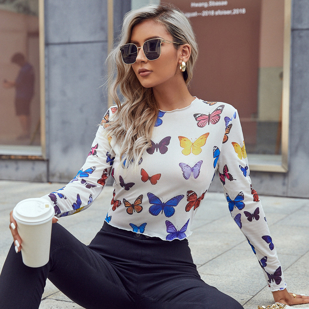 Casual camiseta de mujer de manga larga con estampado de mariposas y corte slim fit