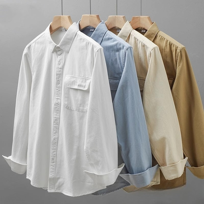 Camisa blanca de algodón de alta gama con bolsillos para hombre